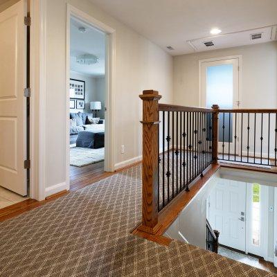 upstairs hall railing with iron details Wilcox Architecture Mt. Lookout